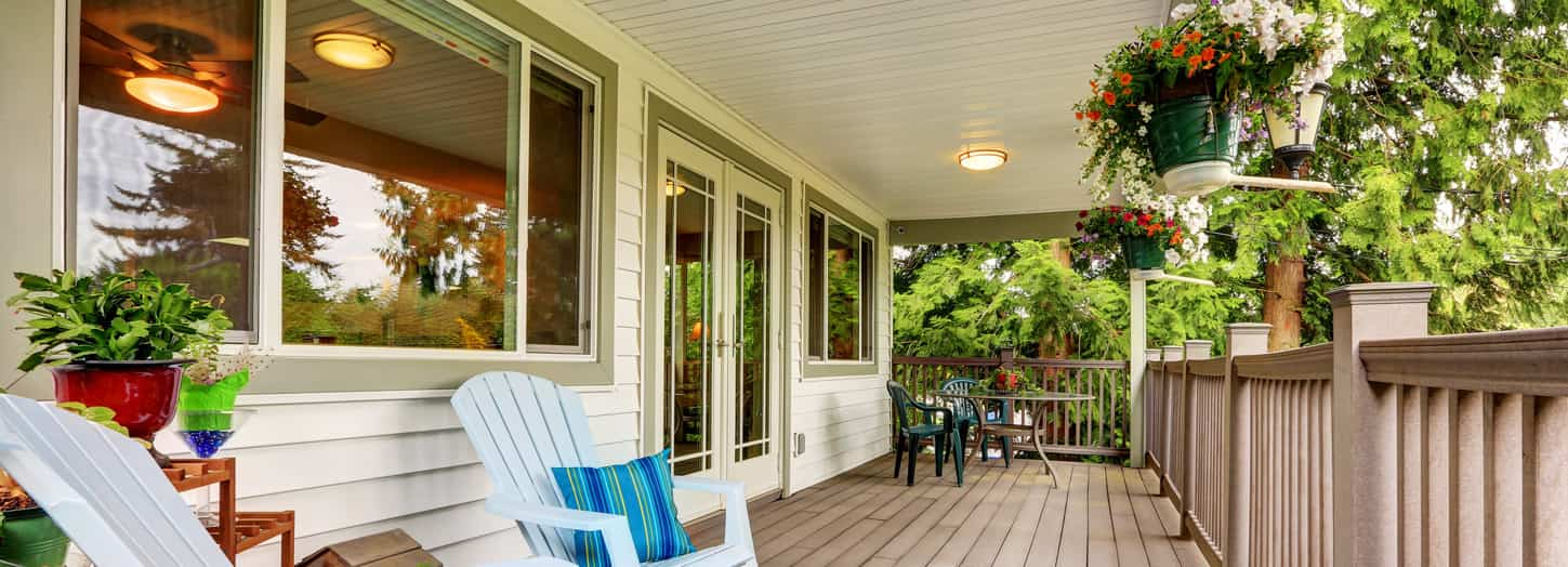 Summertime image of porch and flowers.