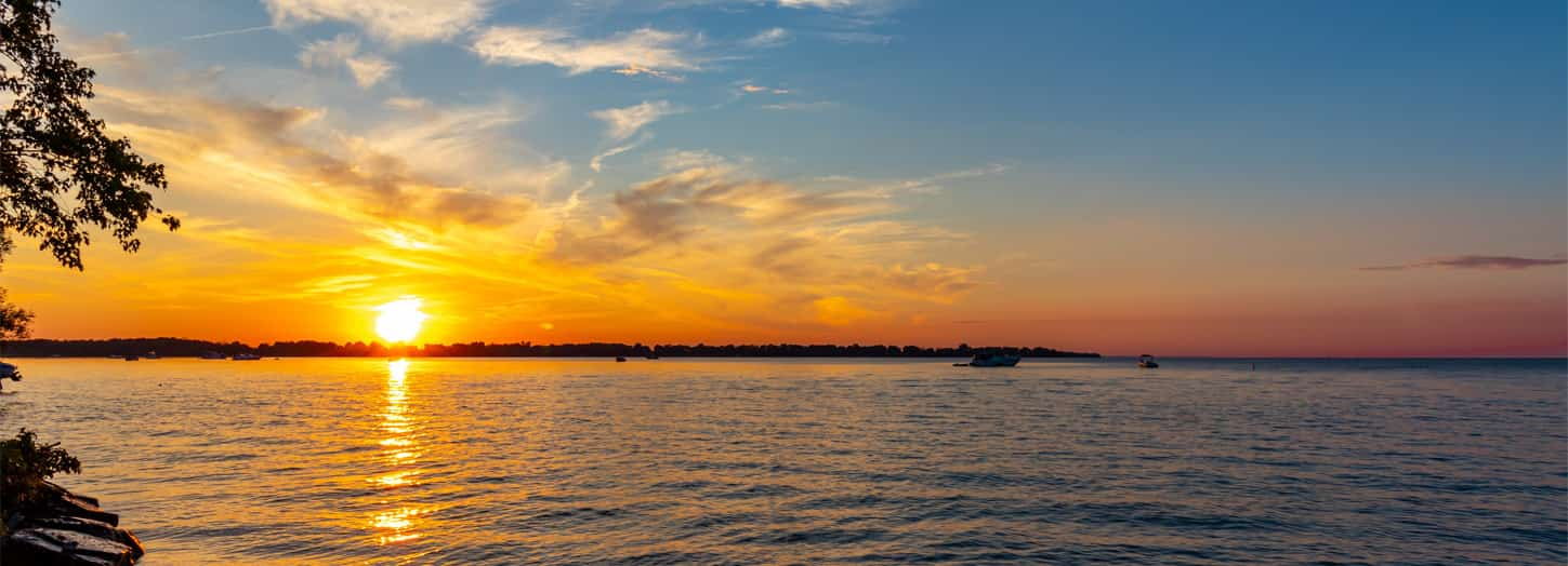 A sunset over a lake.